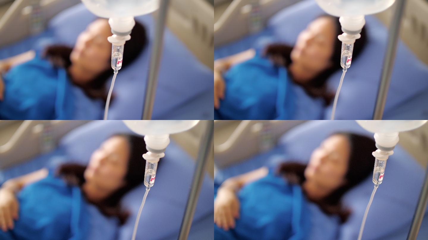 医院静脉滴注生理盐水容量输液泵的女性患者