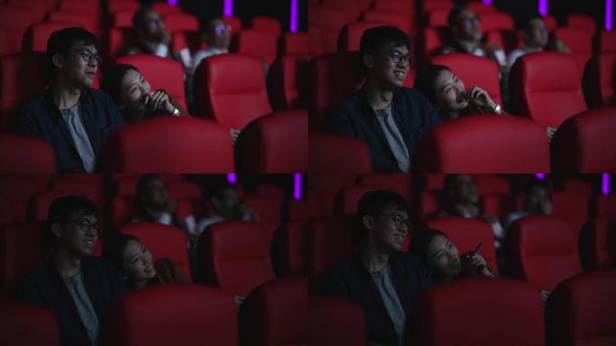 亚裔中国年轻夫妇在电影联谊会上喜欢看电影