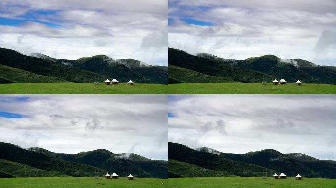 川西大草原雪山帐篷营地空镜头延时