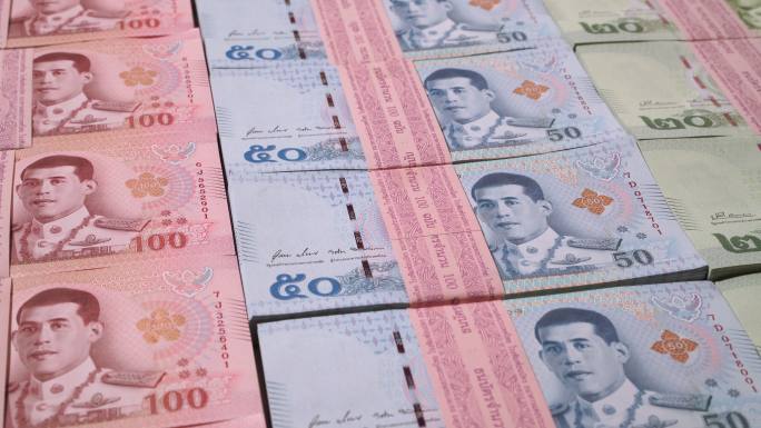 特写多利拍摄的不同叠泰国纸币，泰国