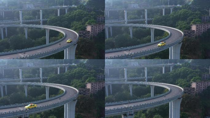 低空航拍出租车驶过重庆苏家坝立交桥
