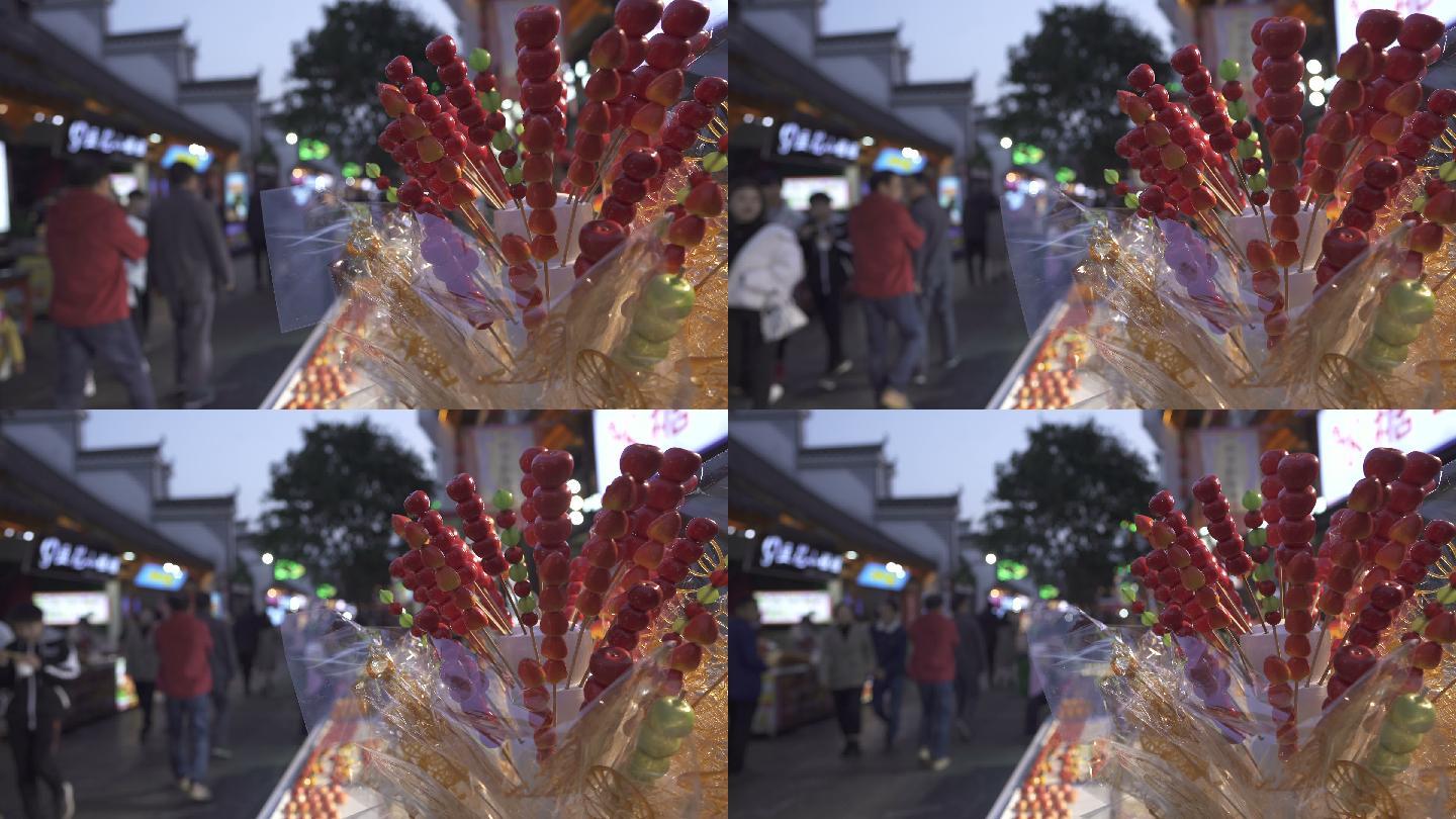 冰糖葫芦：中国传统街边小吃，名为糖衣山楂