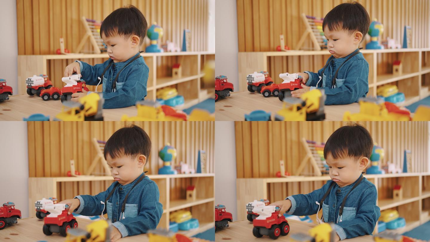 小男孩用玩具练习发展。