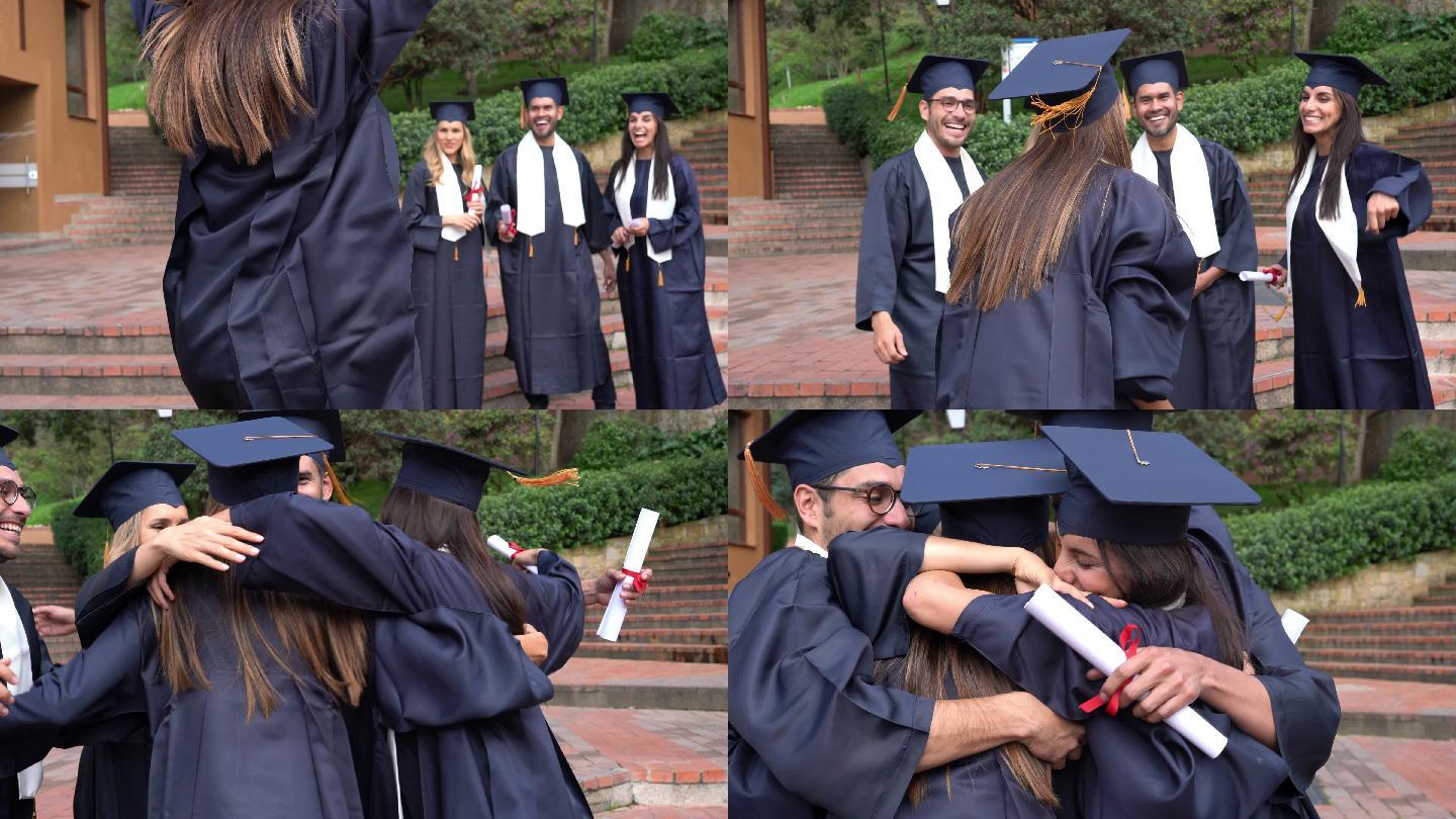 一群朋友庆祝他们刚从博士学位毕业拥抱