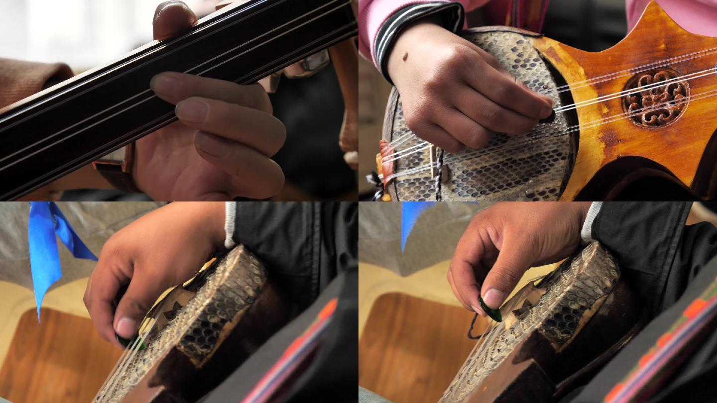 西藏传统乐器弹奏手部特写