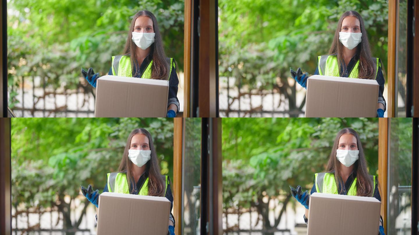 一幅欢快的女性送货员的肖像，戴着防护面罩，看着相机，微笑着将包裹送到家中的客户手中