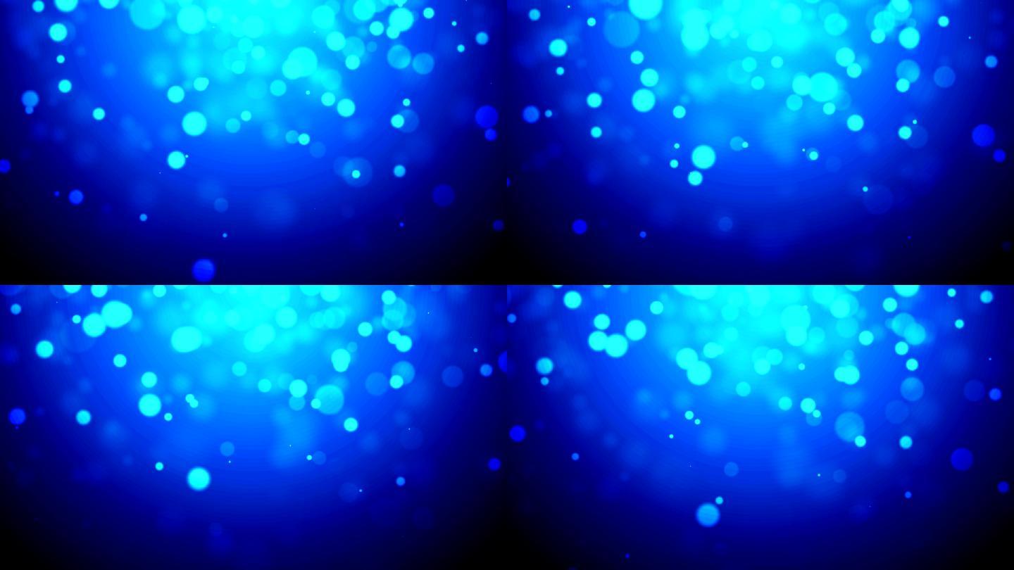 蓝色散焦粒子蓝色粒子下落舞台蓝色背景