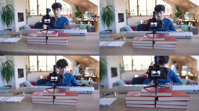 十几岁的男孩录制关于在家里玩合成器的视频教程