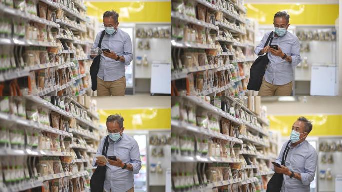 亚裔中国老人戴着口罩在超市购物寻找乳制品