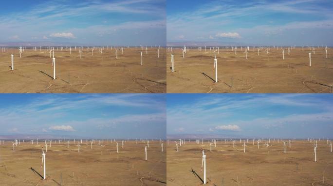 鸟瞰秋天蓝天下的新疆五彩滩风电场航拍视频