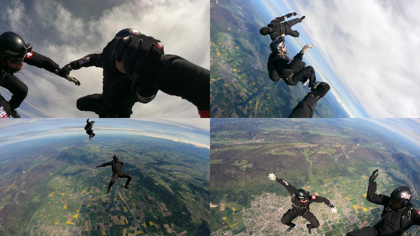 跳伞者翱翔于瑞士乡村景观之上