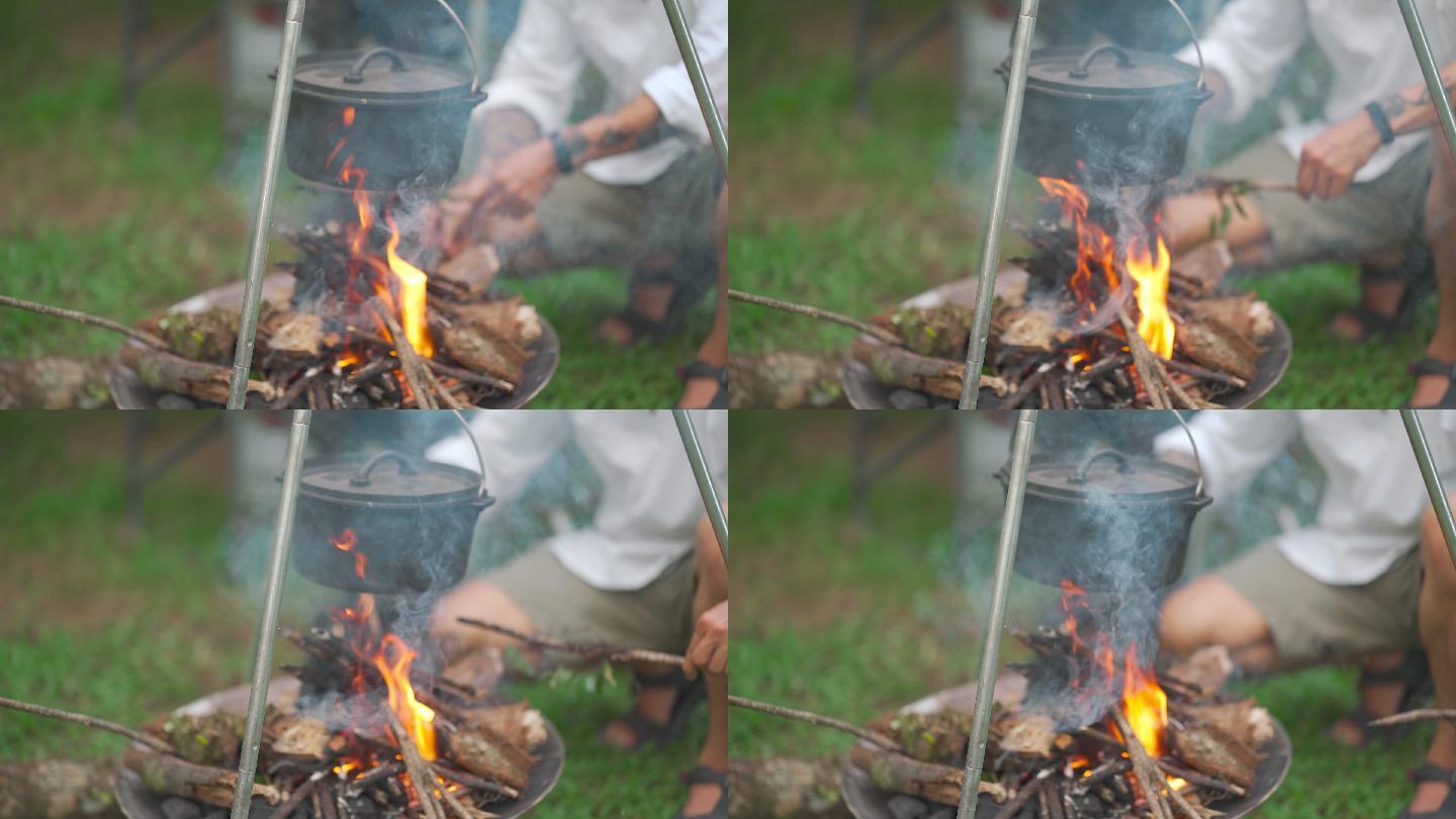 亚裔华裔活跃老人燃起营火准备做饭