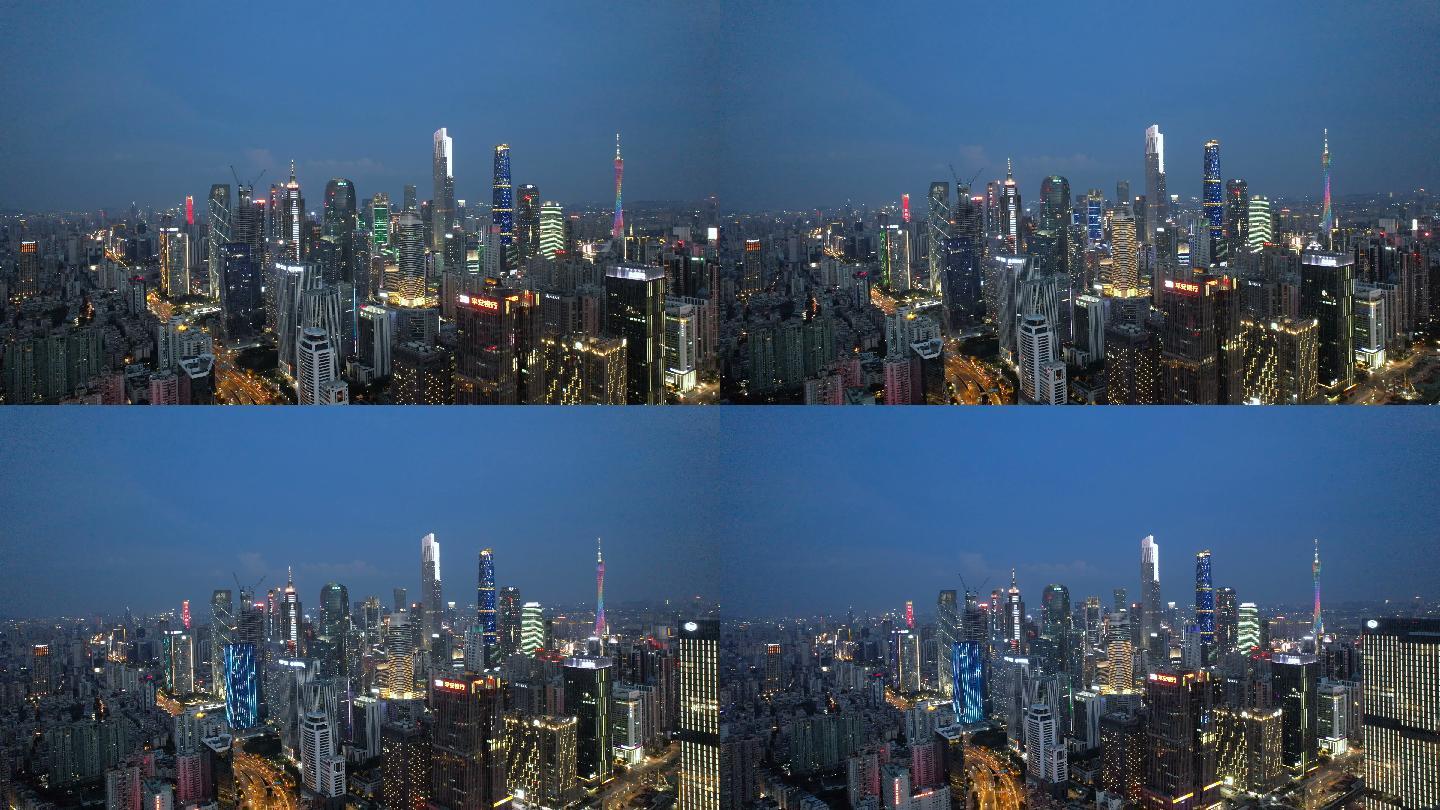 夜间城市摩天大楼的缩小视图