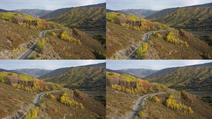 新疆阿勒泰禾木秋天山谷公路自然风光航拍