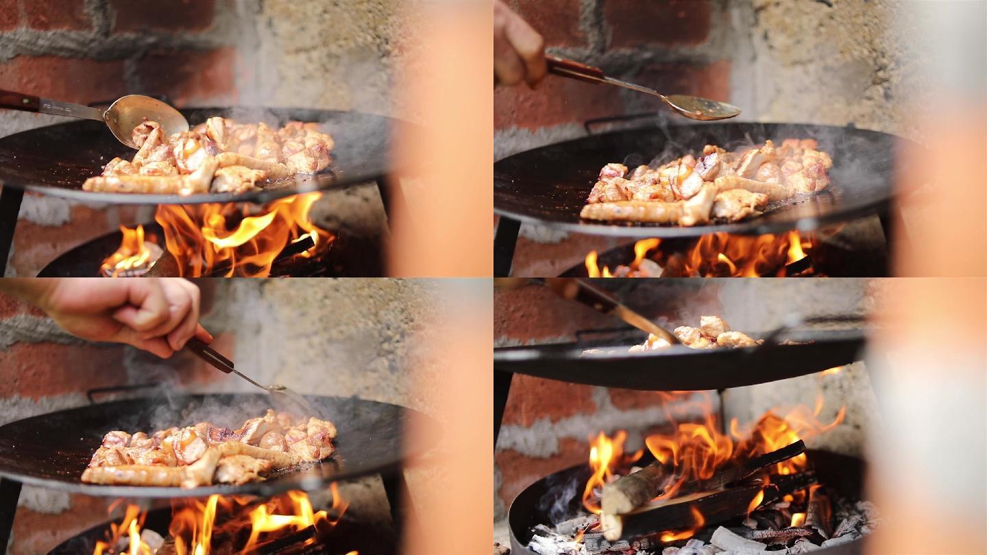 用铁板烤肉炭火做菜炒菜