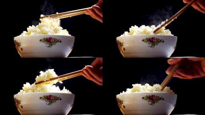 一碗热的米饭。碗里的米饭