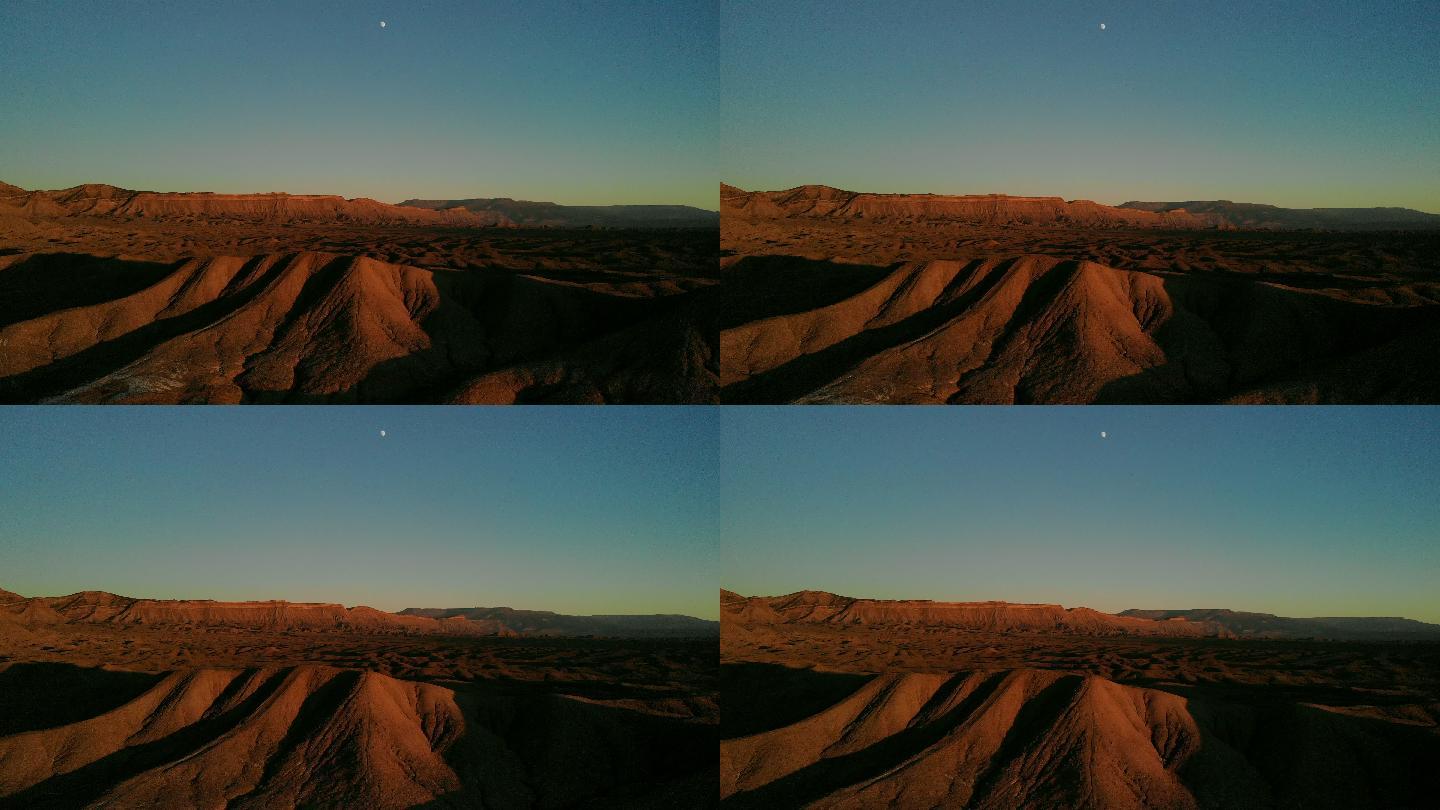 无人机在黄金时段4K视频系列中拍摄日落地平线上的美国西部沙漠和灿烂的科罗拉多州