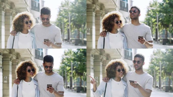 年轻夫妇在智能手机上寻找方向