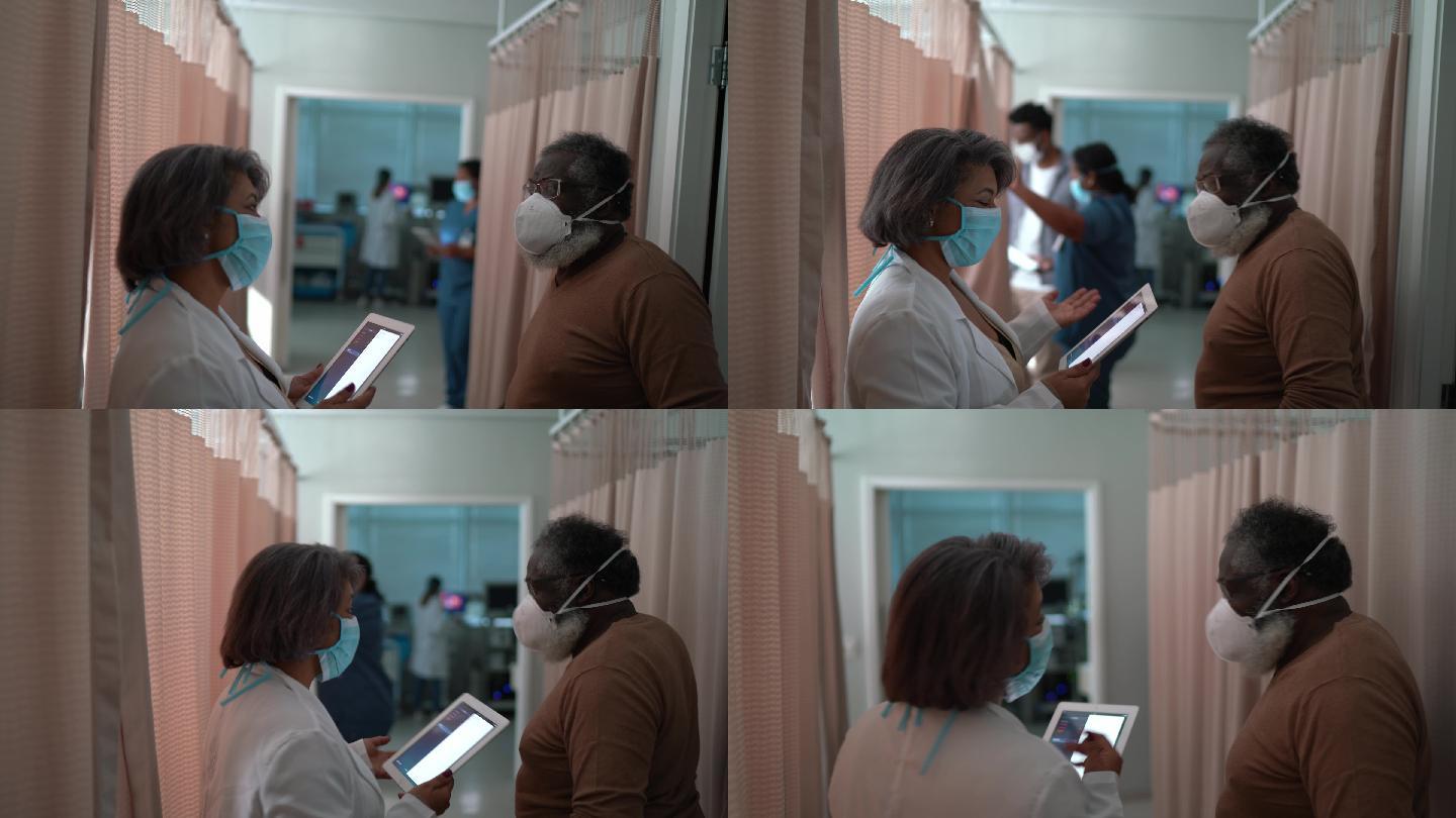 医生在医院预约时与患者交谈-戴口罩