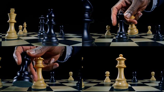 在国际象棋比赛中，DS男性手拿着一个黑皇后和他的白皇后