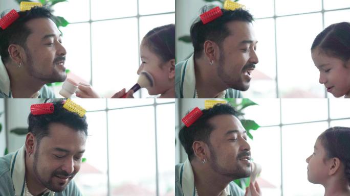 亚洲单身父亲在家照顾女儿，玩耍，女孩用化妆品为父亲化妆，一起教书，在家教育理念