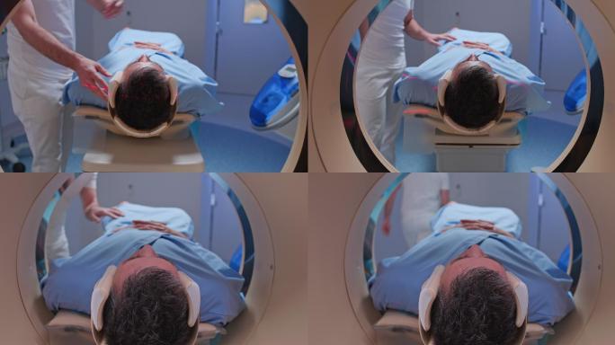 DS男性患者头朝前滑入CAT扫描仪