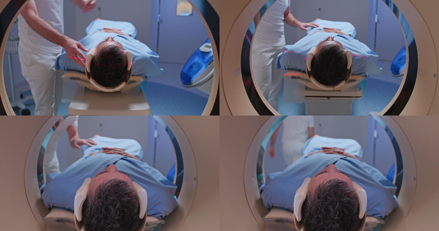 DS男性患者头朝前滑入CAT扫描仪