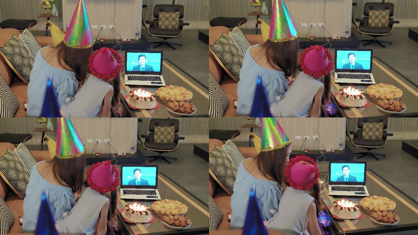 一个有父亲的家庭通过视频电话祝贺女儿的生日。