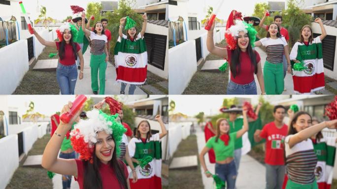 青少年拉丁朋友在户外散步庆祝墨西哥足球队获胜