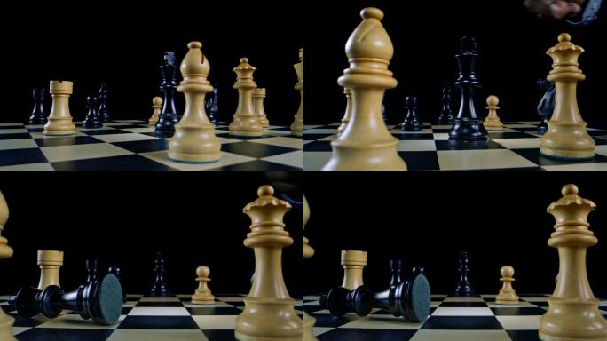 在一场象棋比赛中，一只棕色的雄性手向黑王翻转