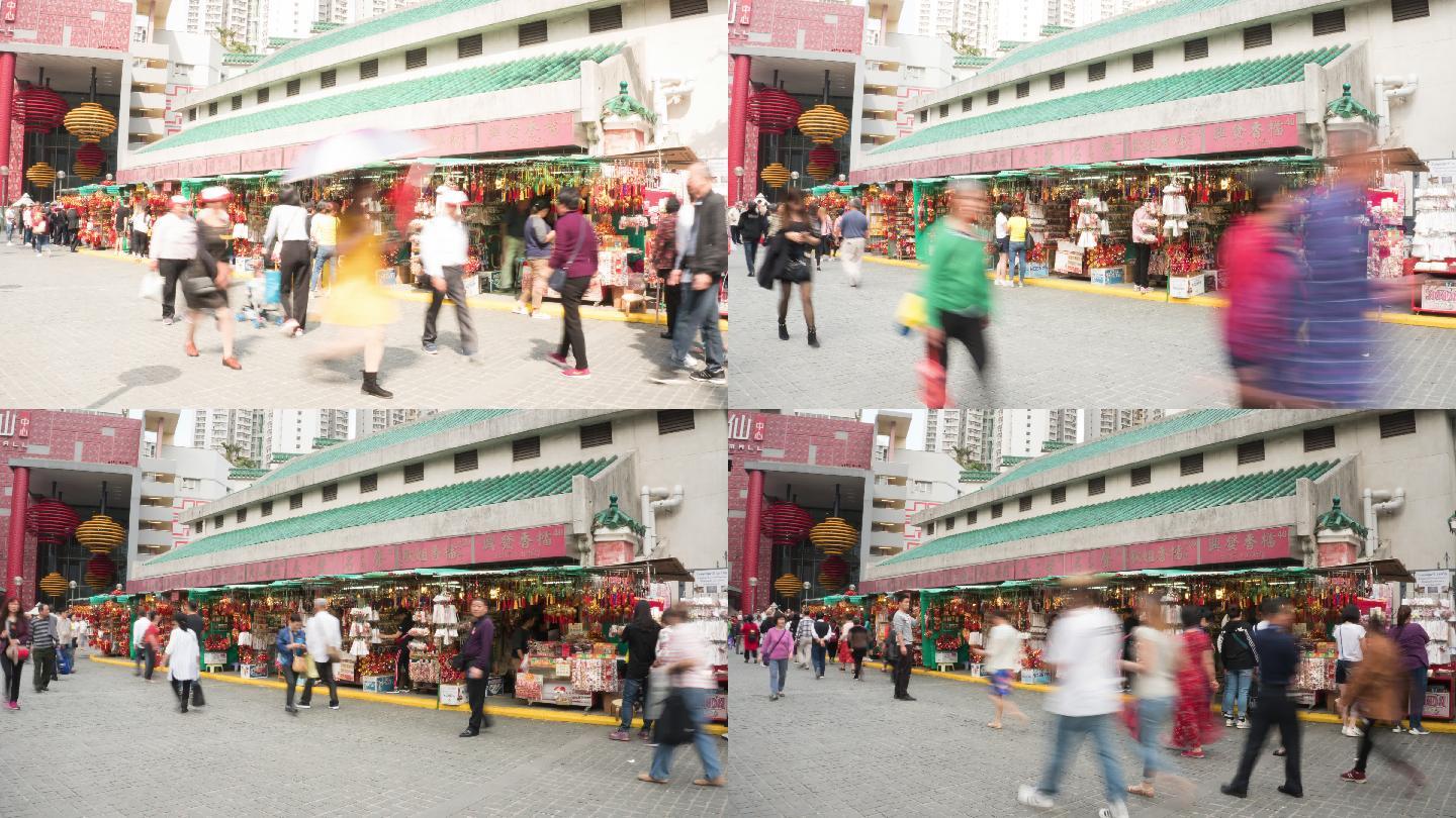人群和游客参观王大仙庙入口处的礼品店