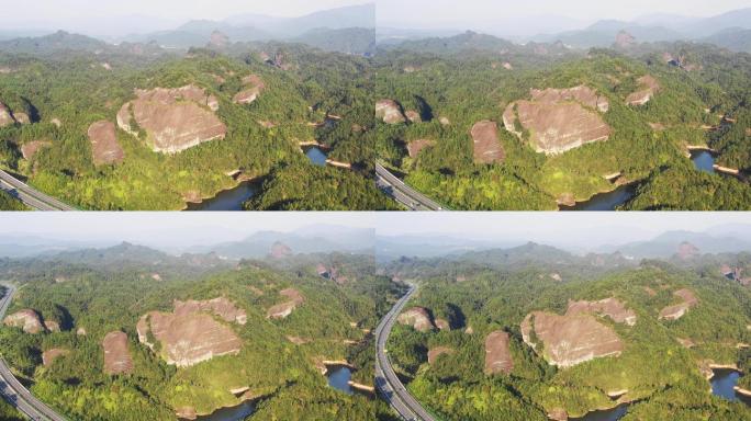 航拍铜鼓县丹霞地貌及杭长高速公路