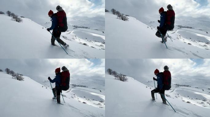 冬天背着背包在山上徒步旅行的男人