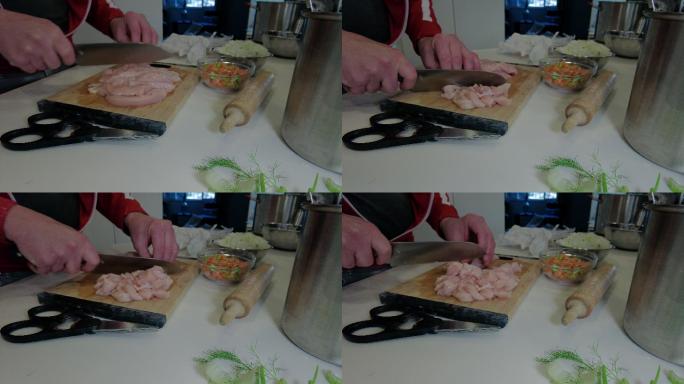 切割鸡胸肉制作自制鸡肉面条汤厨师烹饪肉类和蔬菜延时视频系列