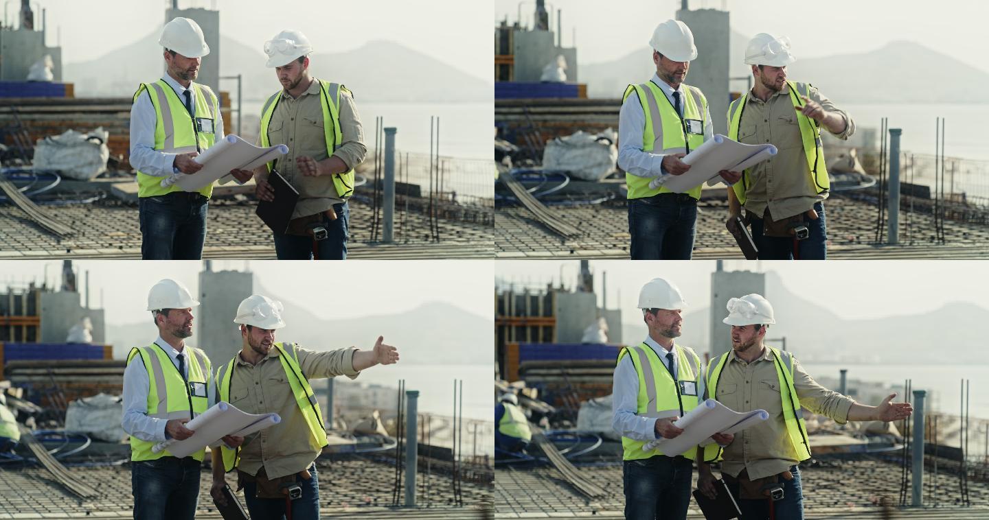 两名男子在施工现场一起工作时看建筑平面图的4k视频片段