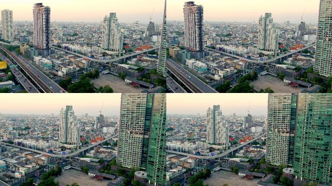 曼谷市区快速移动的全景照片，天空火车轨道和桥梁。