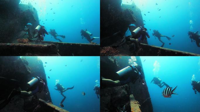 人们在海上探索沉船的4k视频片段