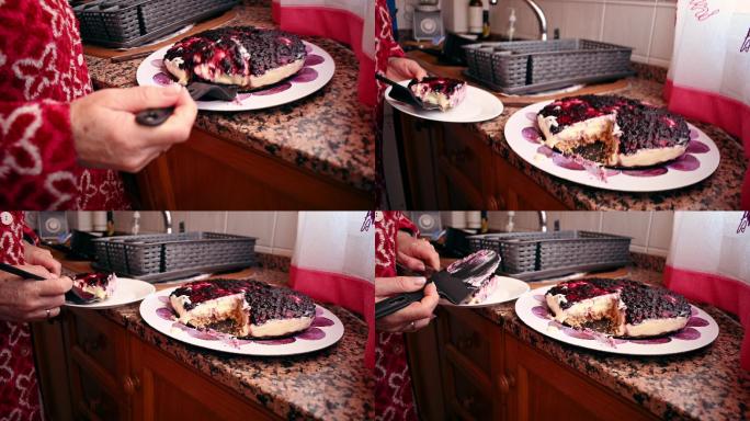 特写镜头：一名女子打破并将一块芝士蛋糕放在盘子上