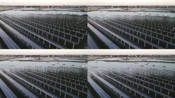 黄昏时分海上太阳能发电厂的无人驾驶鸟瞰图