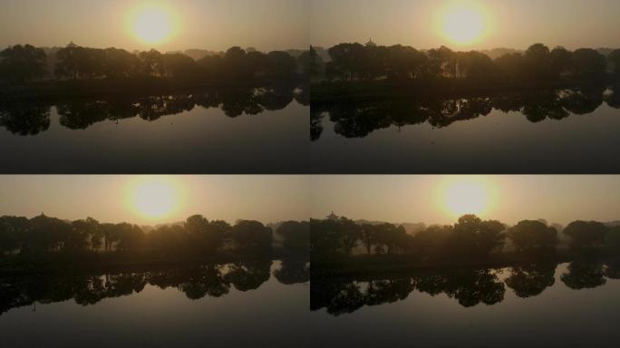 太阳升起下的河流