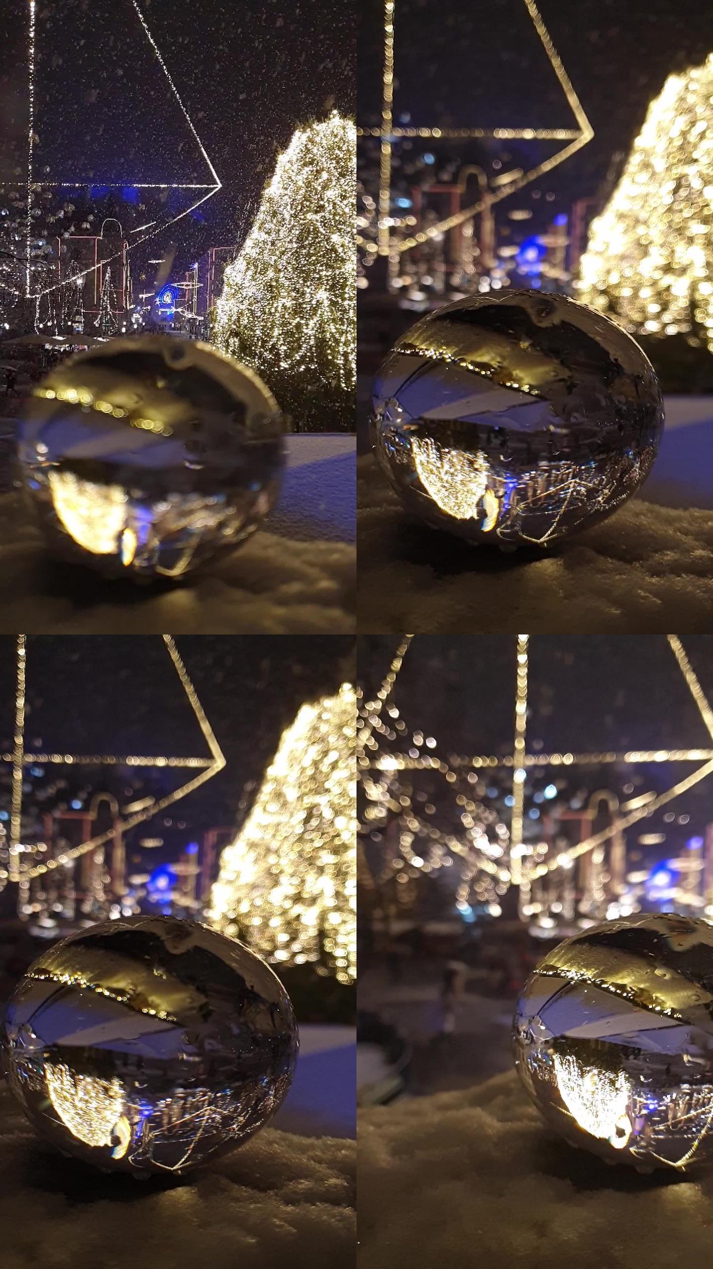 节日灯火通明的卢布尔雅那下雪-水晶球前