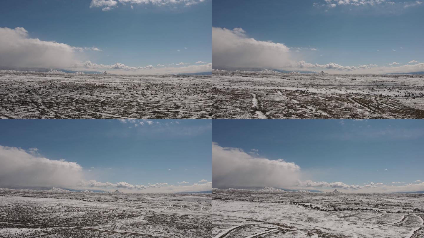 科罗拉多州美丽沙漠的延时无人机POV山麓和山区冬季假山降雪极端天气视频系列