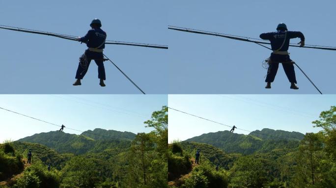 工人在山村架网线