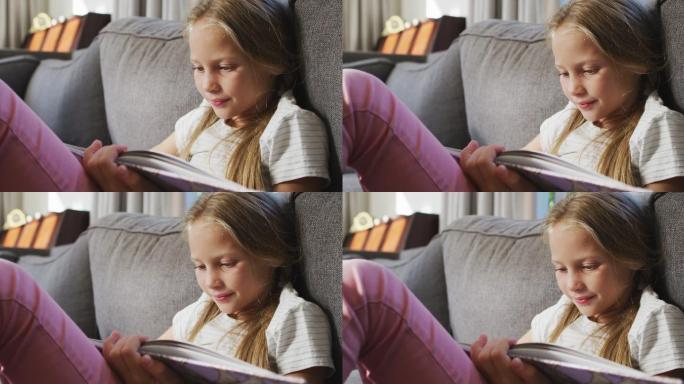 一个白人小女孩在看书