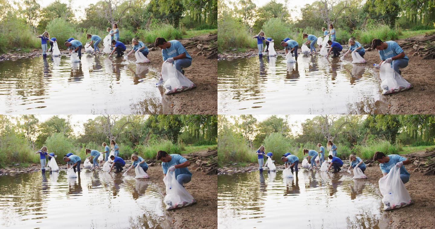 中年人在河流清理日做义工
