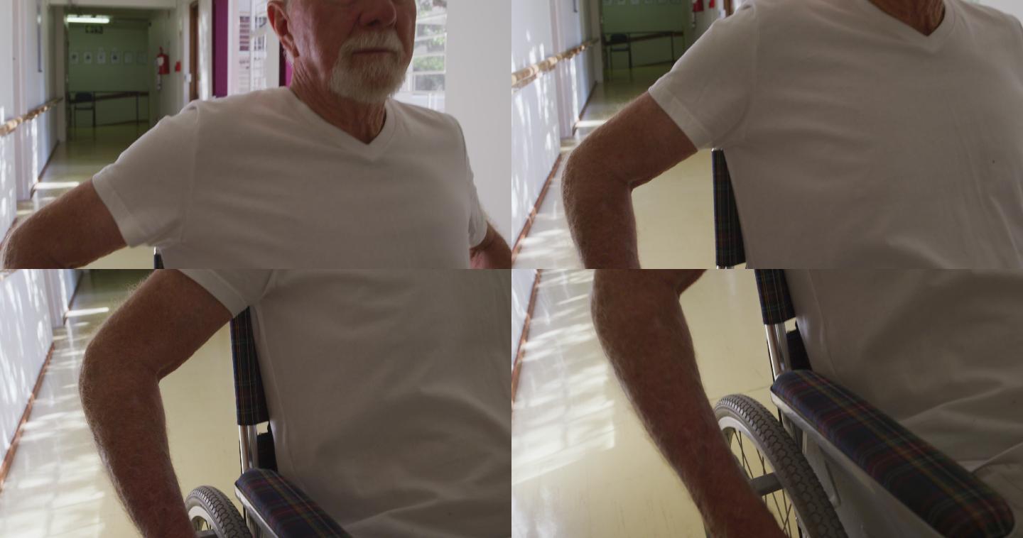 一个老年人在养老院的走廊里与人保持社交距离