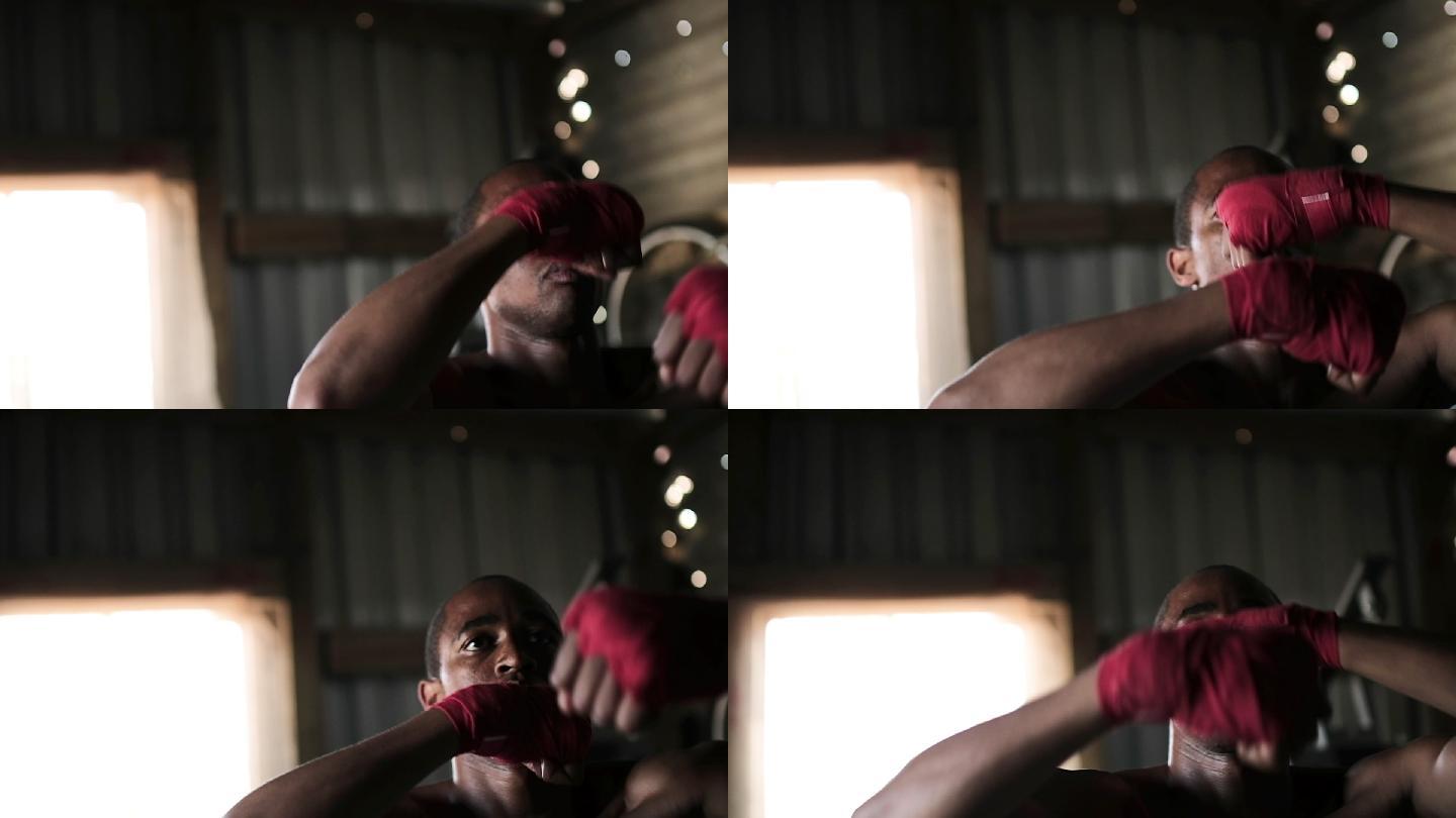 拳击手在健身房里打拳击袋