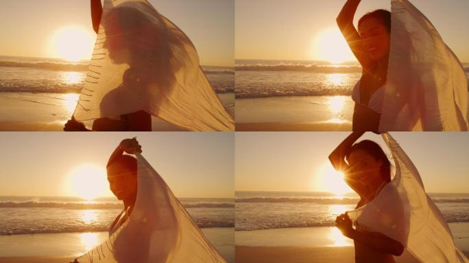 海边的年轻女子海边慢动作跑沙滩美女日光阳