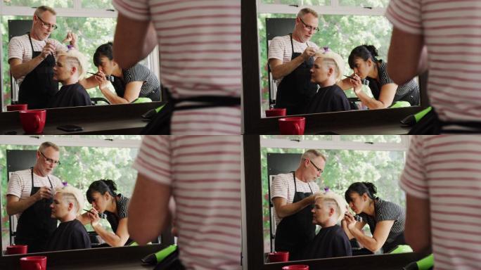 侧面的女人正在做她的头发由发型师