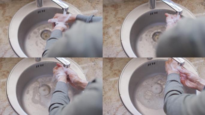 新冠肺炎疫情期间自我隔离的妇女洗手